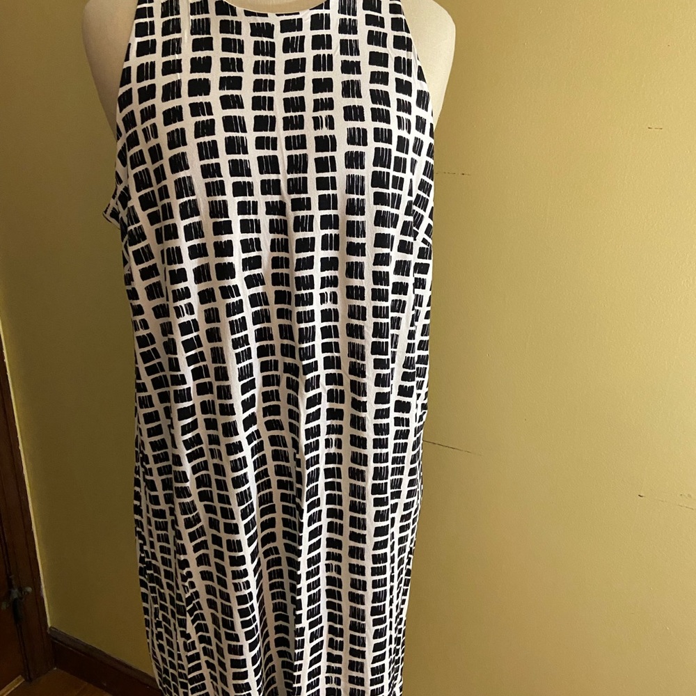 Swing dress, thick material, very pretty.